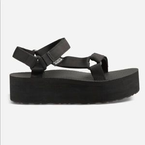 Teva Black Platform Sandals with Adjustable Straps and Rugged Sole